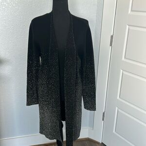 Woman’s black & silver sparkle open front, long - length long-sleeved sweater.